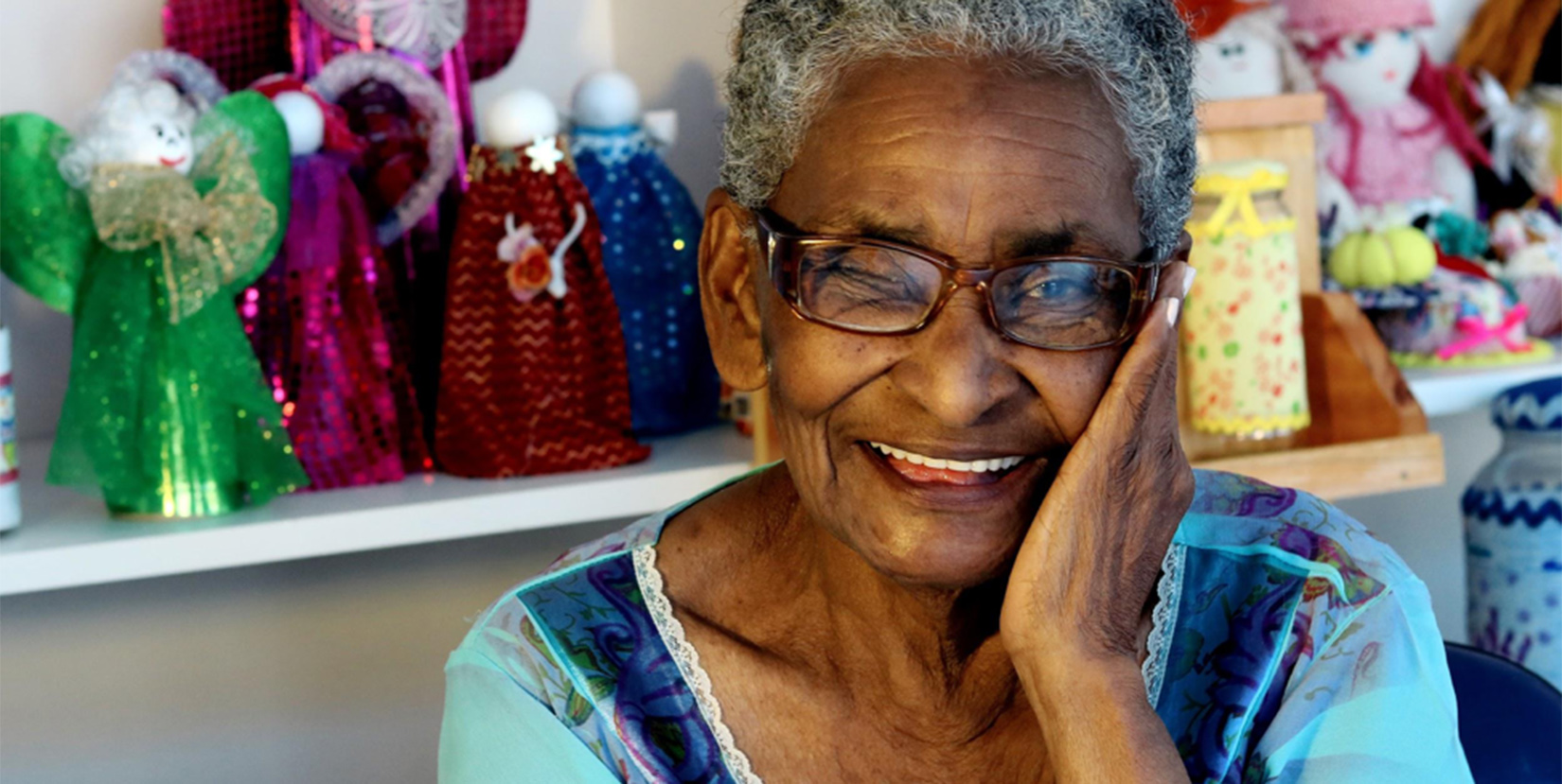 Older woman, smiling - Looking after your well-being becomes even more important as you face the many physical, mental, and emotional challenges that come with growing older.